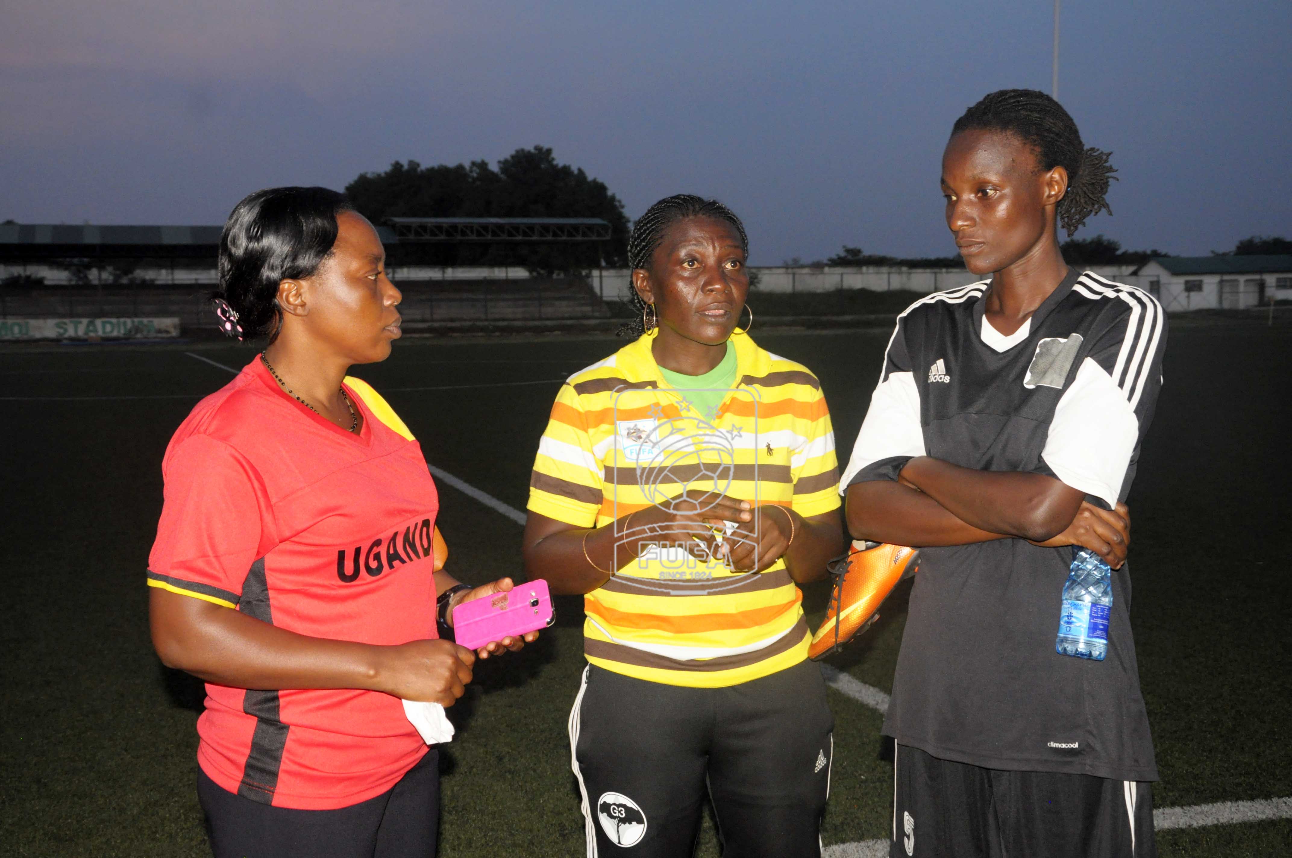 LOD Agnes Mugena (left) Crested Cranes coach Majida Nantanda and team captain Christine Wanyana discussing after the ast training