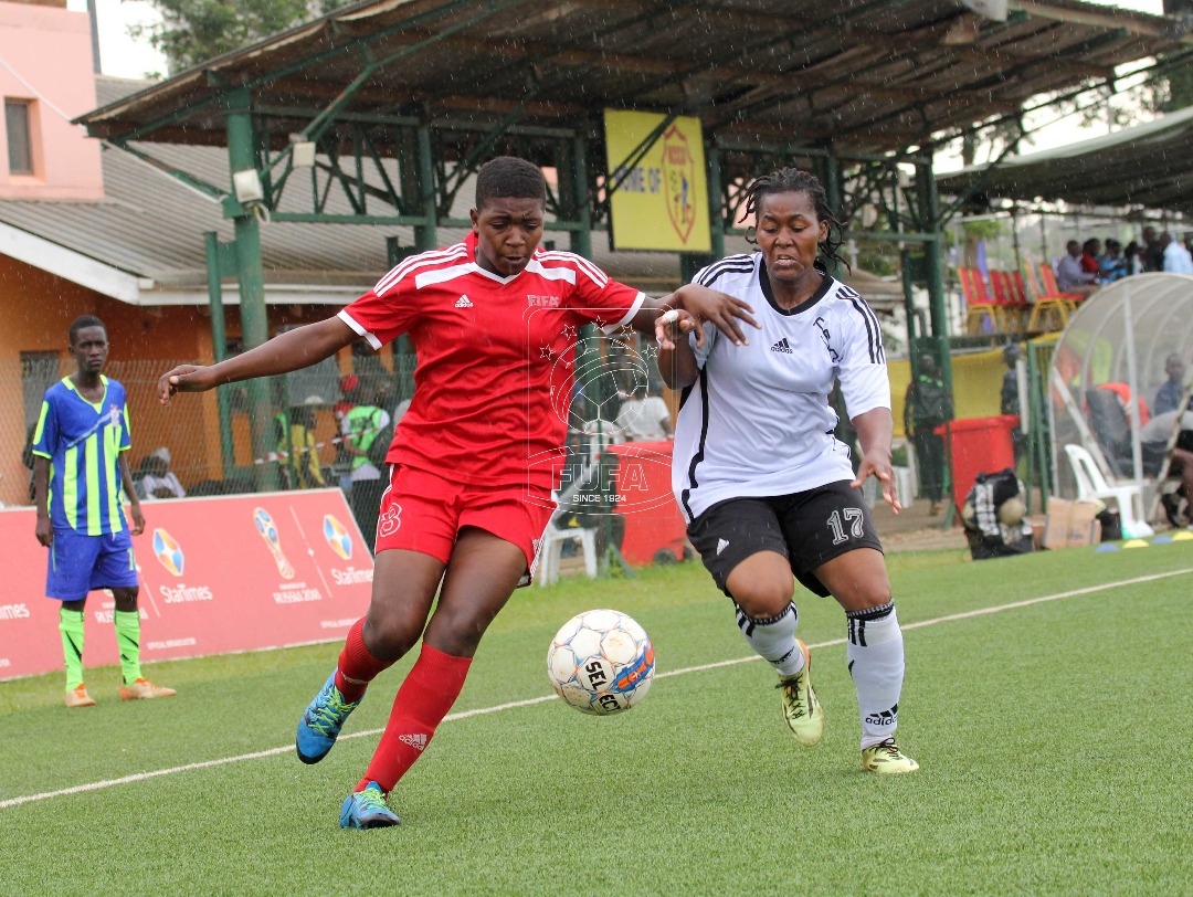 Gafford Ladies' Anitah Nabirye (8) in action agains Kampala Queens FC Kisitu Faridah(17( during the 3rd palce playoff at Lugogo