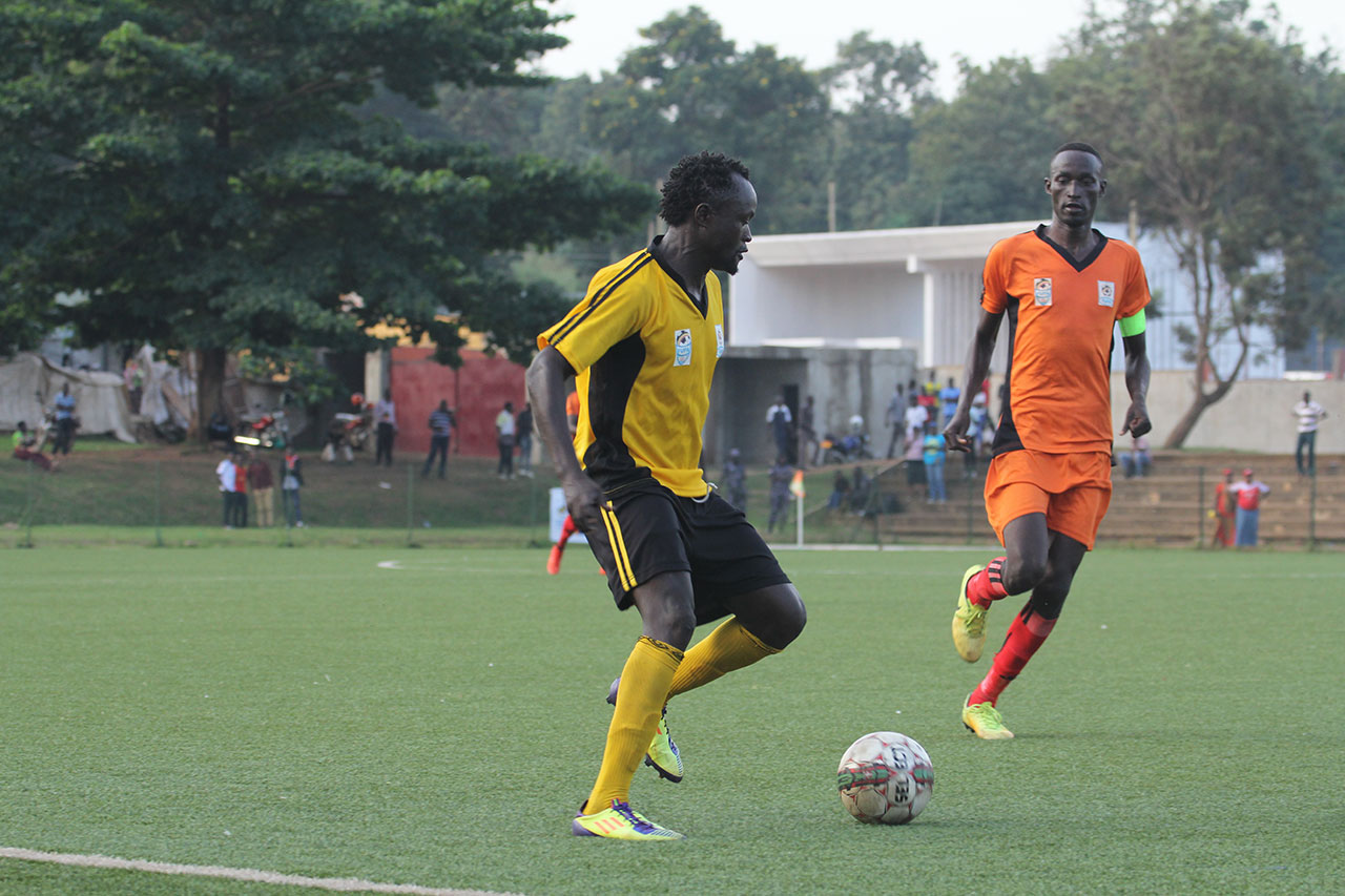 Bugisu Captain Nicholas Wadada takes on Teso Captain Godfrey Akol