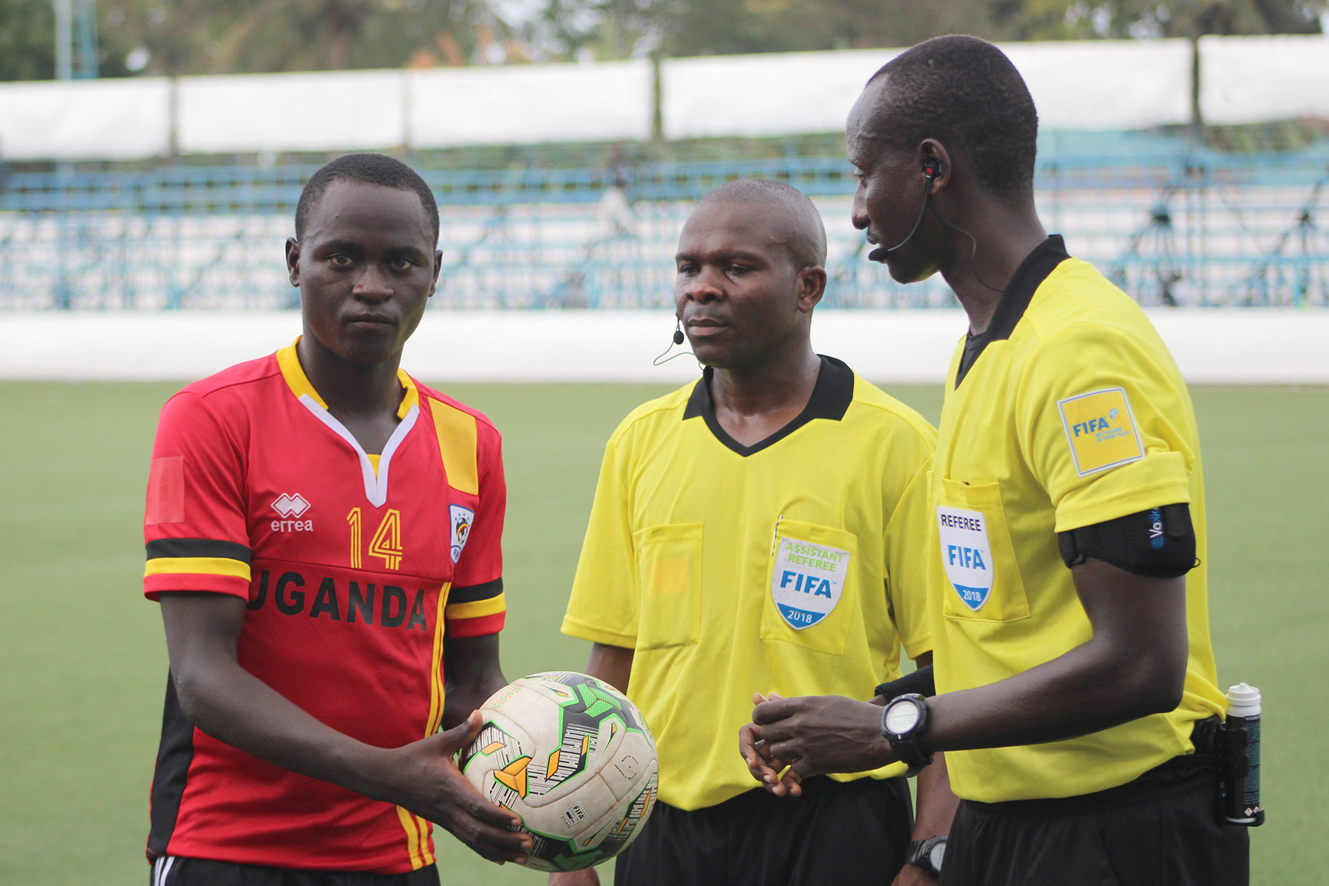 Yiga Najib Recieves an autographed ball from the center referee Georges Gatogato from Burundi after Scoring a hat-trick